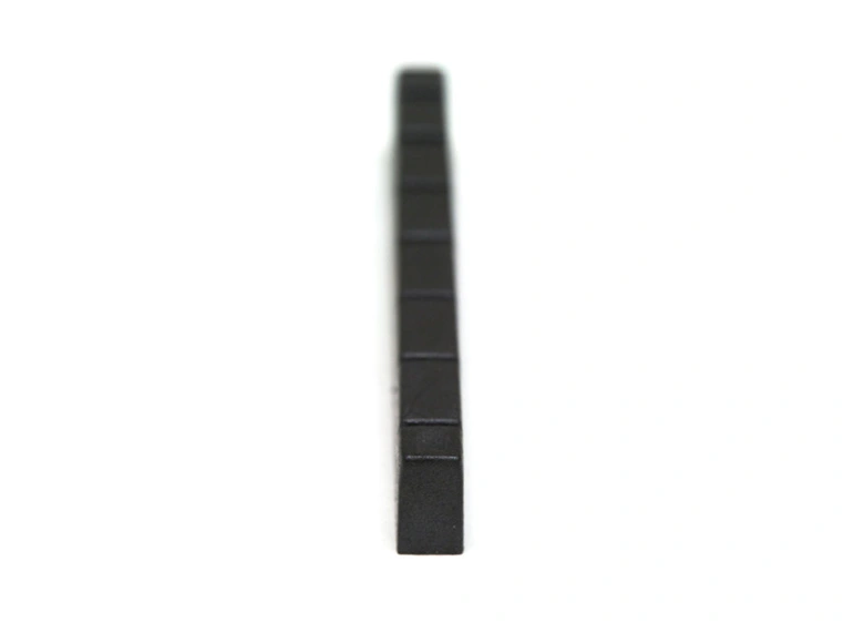 Graph Tech PT-5700-00 Black TUSQ XL Slotted Guitar Nut, 7-String, Curved 
