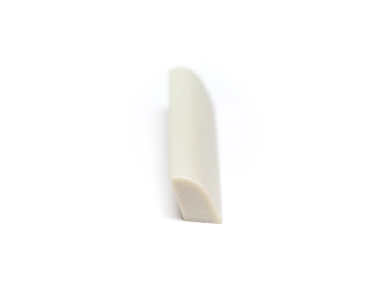 Graph Tech TUSQ PQ-M100-00 - Acoustic Guitar Nut, Angled Bottom, Blank 